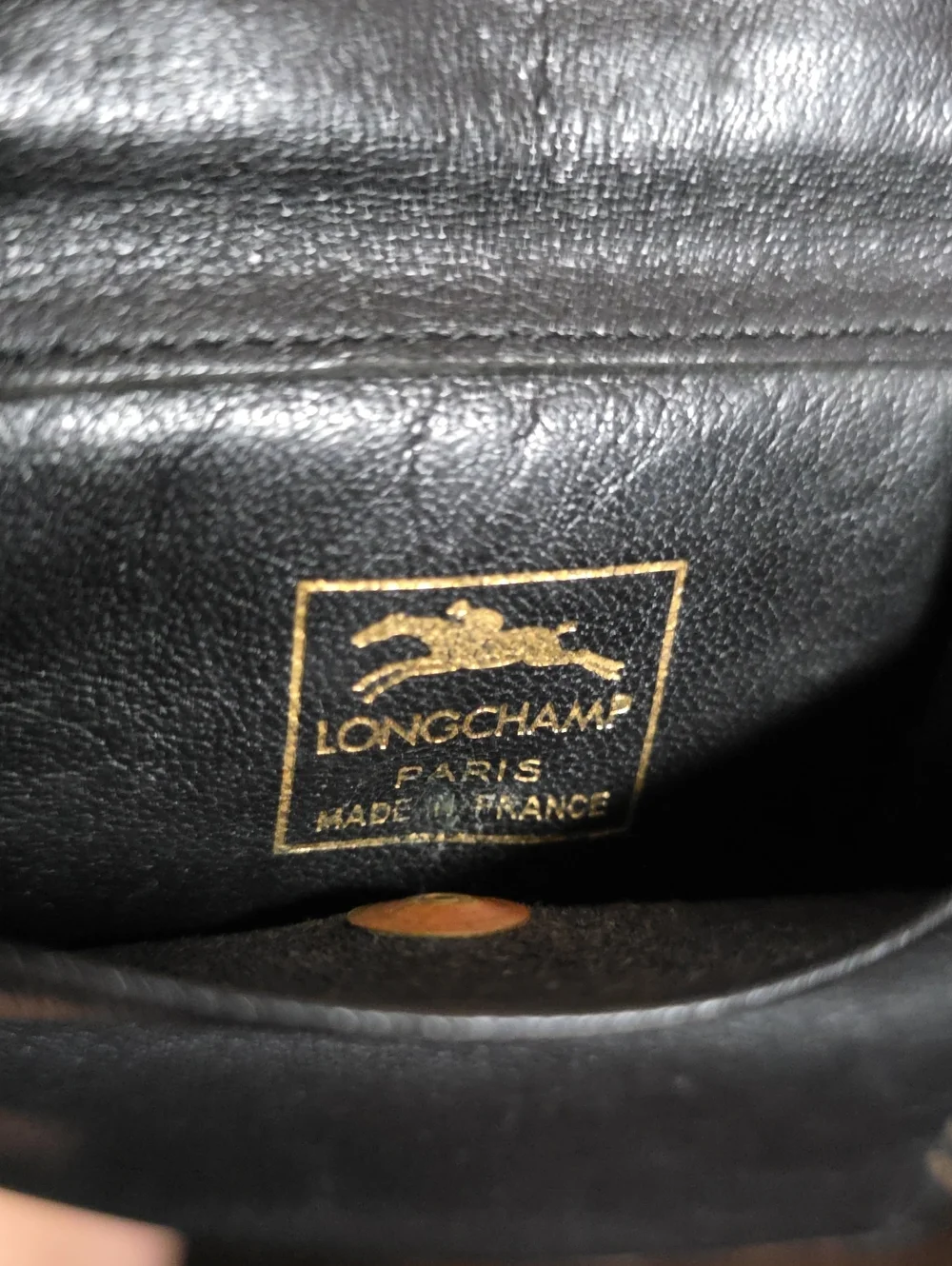 Longchamp Black and Gold Printed Leather Wallet
